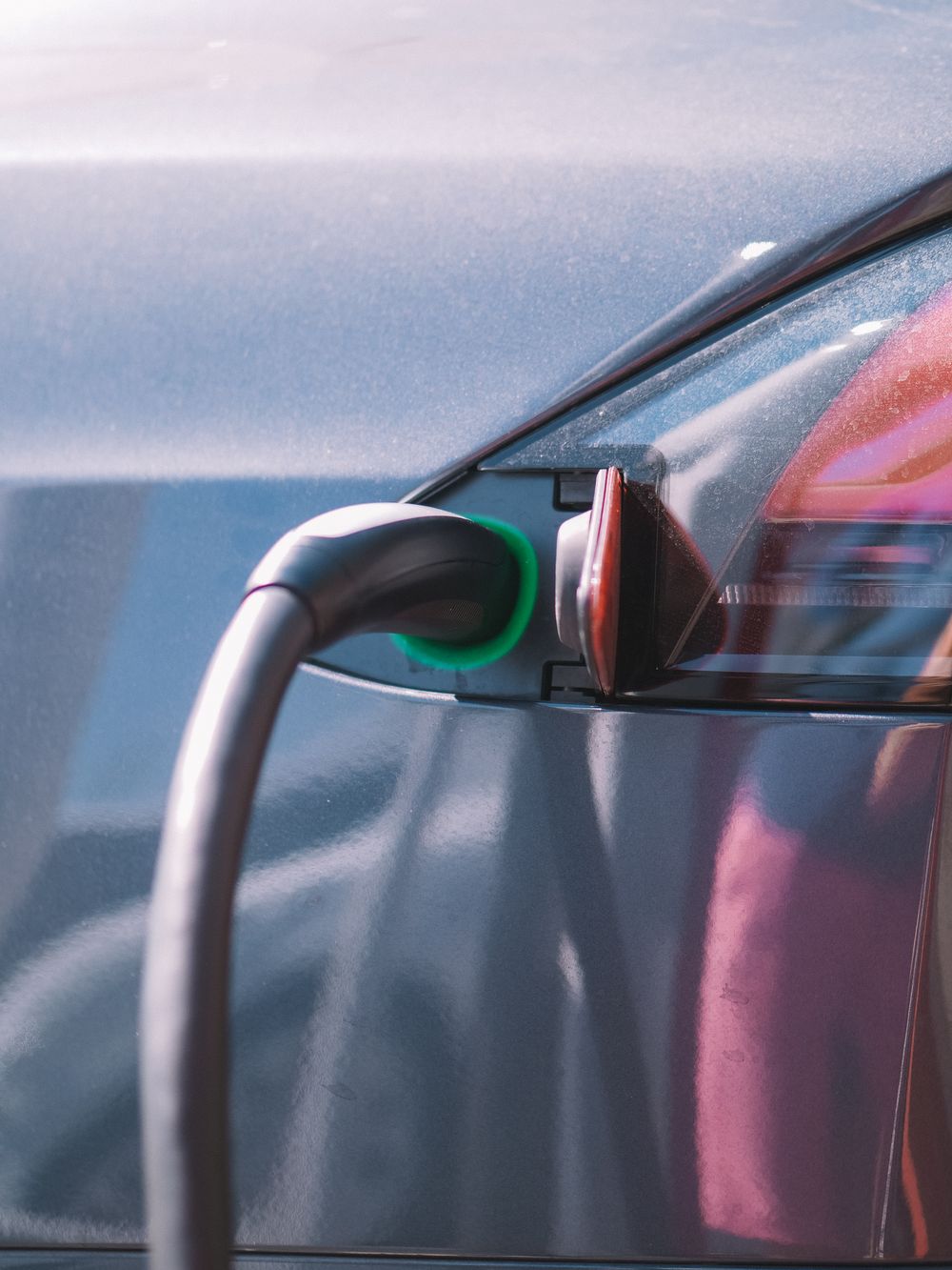 Charging cable plugged into an electric car